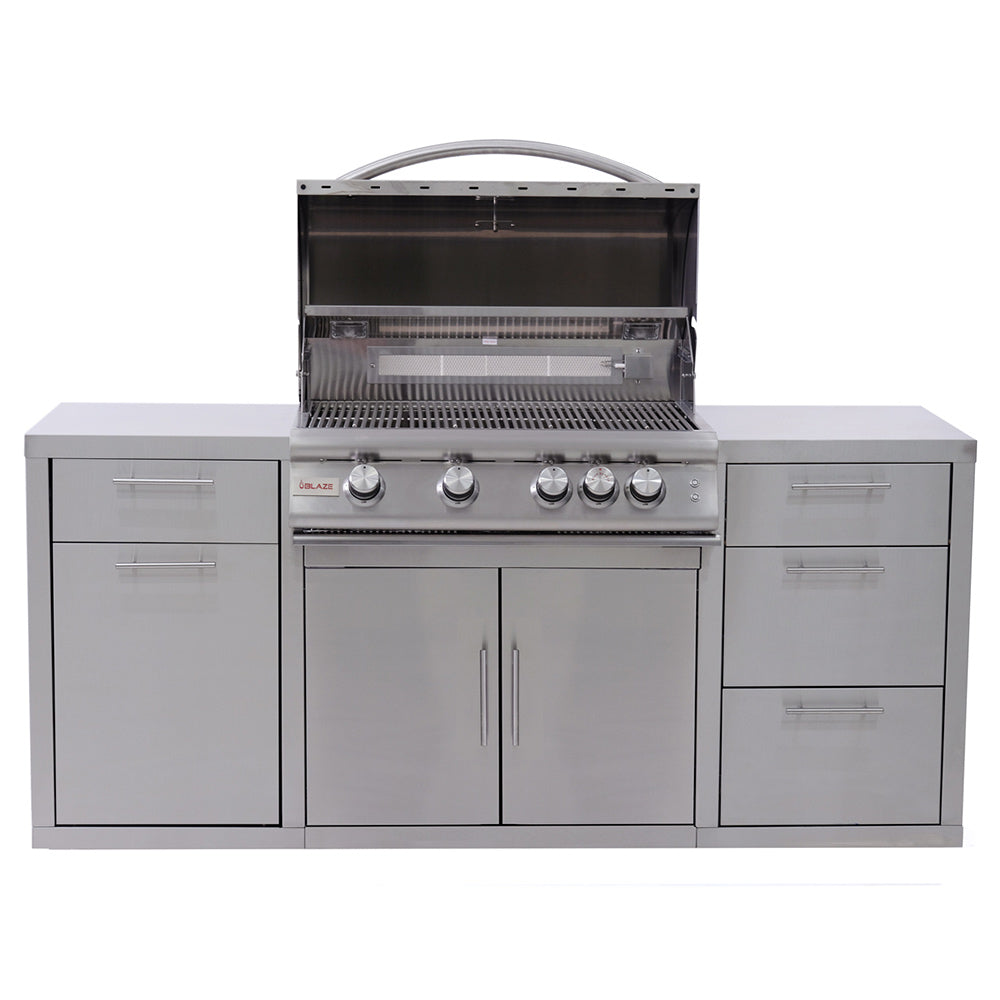 Stainless steel freestanding gas grill with closed lid, control knobs, and storage cabinets