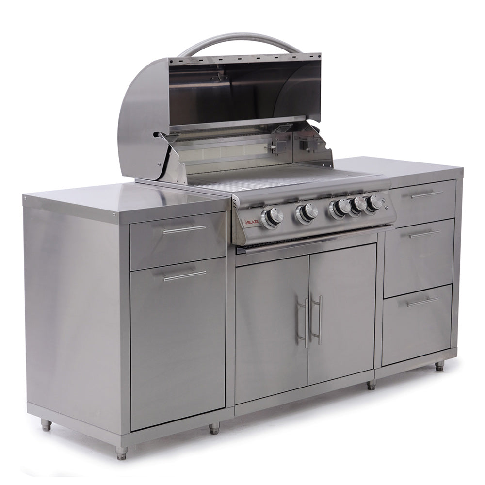 Stainless steel freestanding gas grill with open lid, control panel, and side storage doors