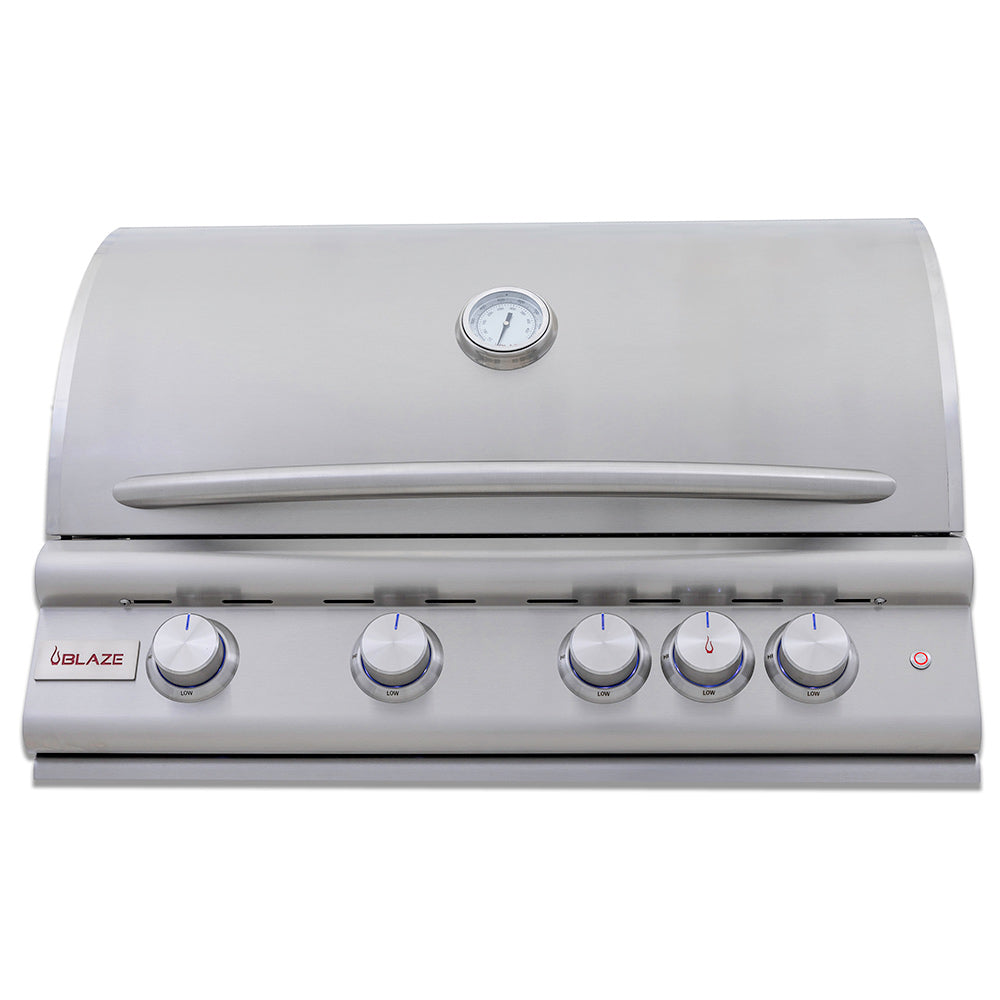 Built-in gas grill with lid, thermometer, and control knobs on front panel