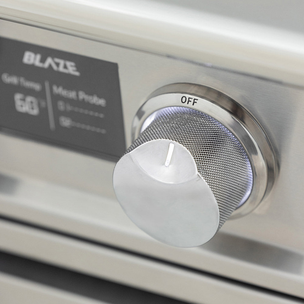 Gas grill control knob on stainless panel with dial labeled OFF