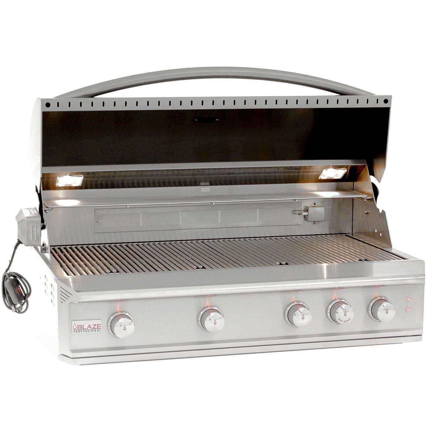 Opened stainless steel gas grill showing cooking grates and front knobs