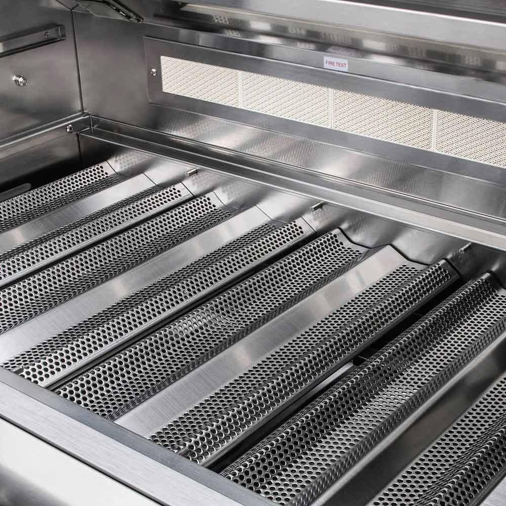 Gas grill cooking area with stainless steel grates and perforated flame-tube covers