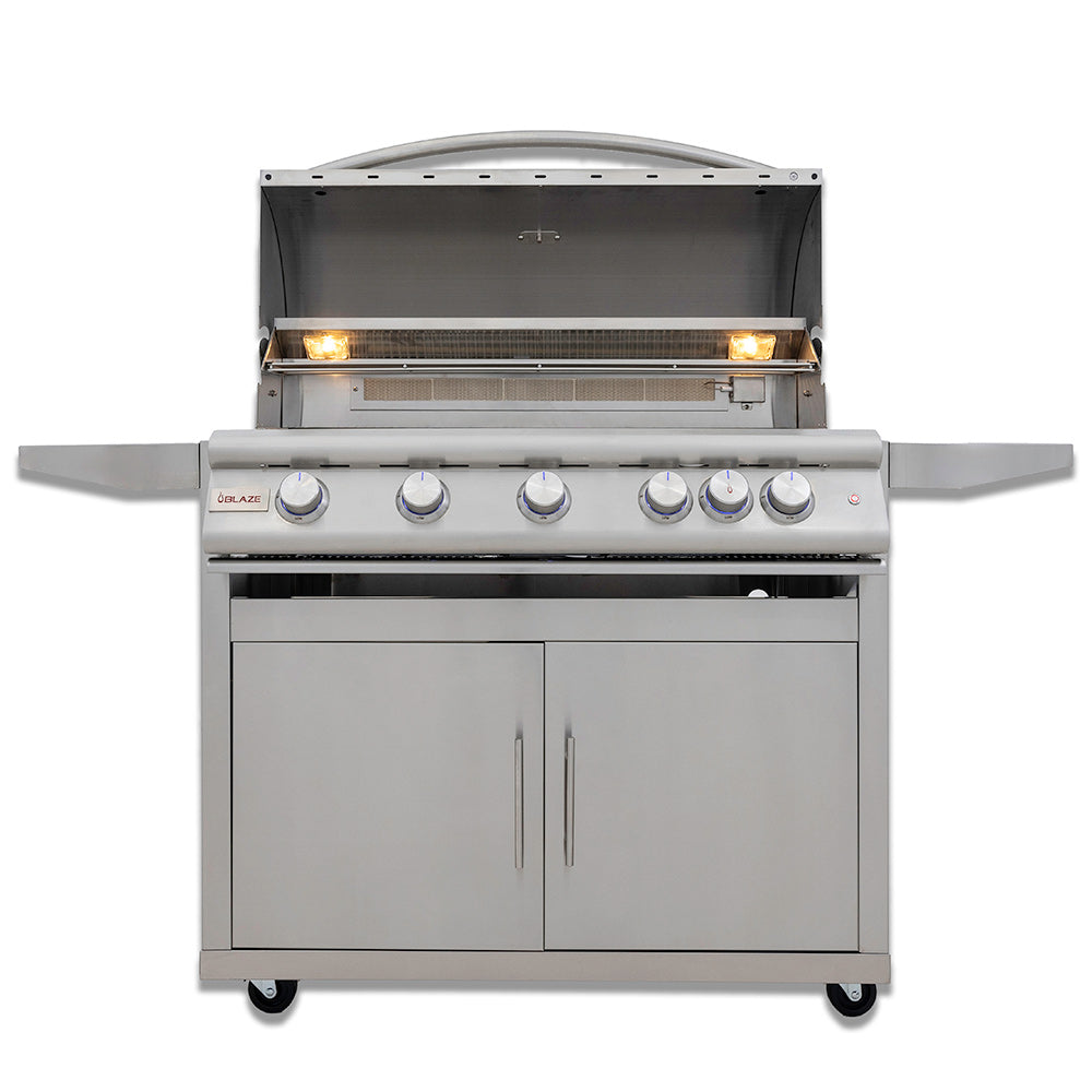 Gas grill on cart with lid open, lit burner bars and front control panel.