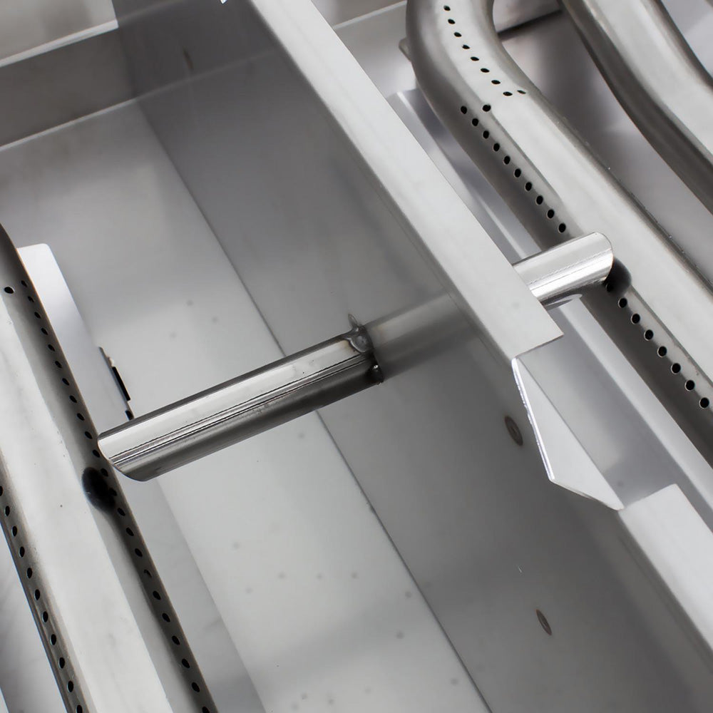 Built-in gas griddle with perforated burner tubes and stainless heat deflectors
