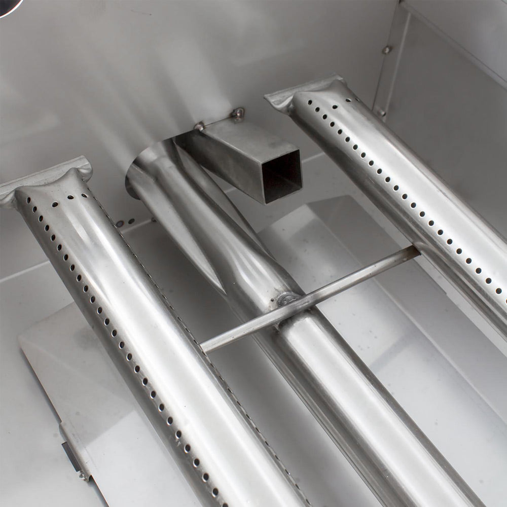 Built-in gas griddle burner tubes with spacing bars above grease channels