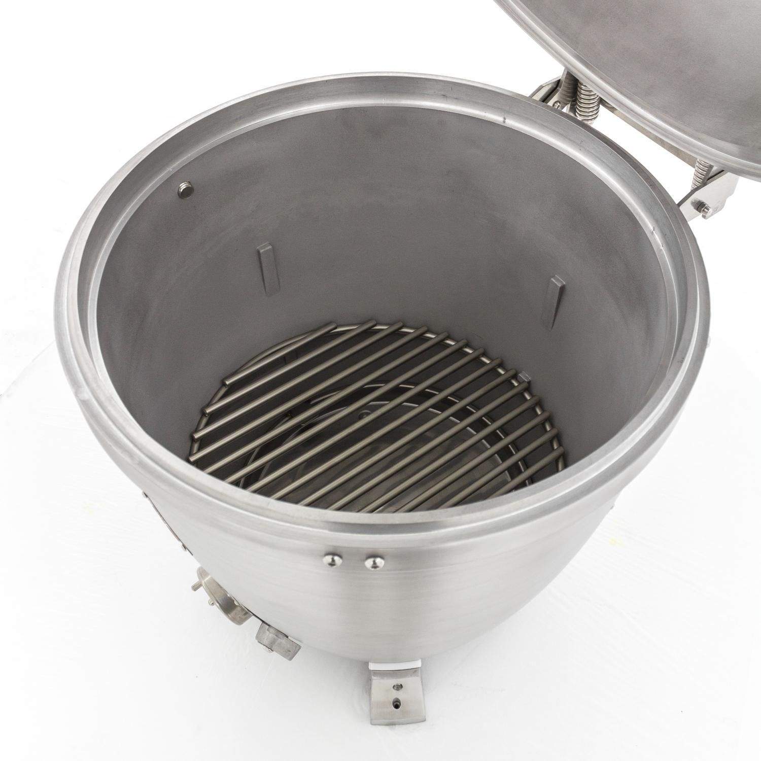 Cast aluminum kamado grill interior with charcoal grate and side air guides