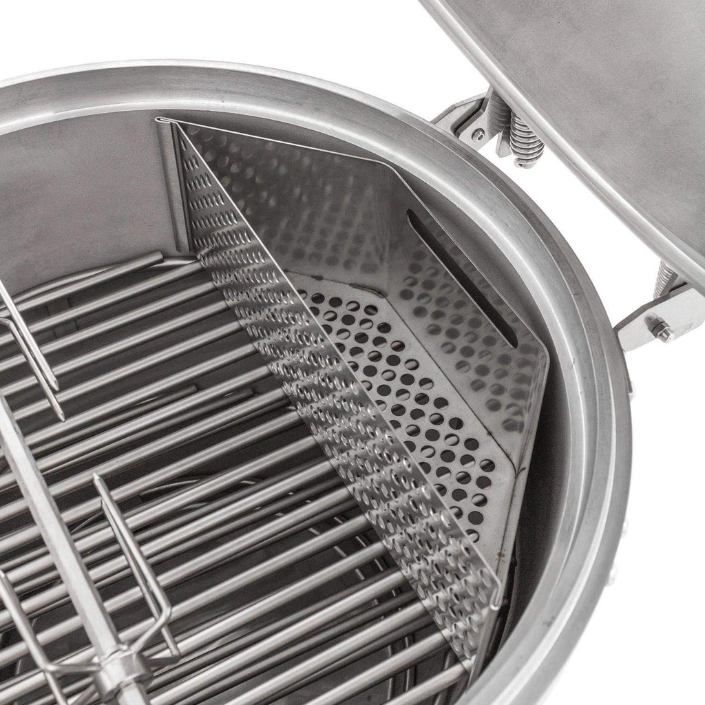 Rotisserie spit rods with perforated shield panel inside round grill chamber