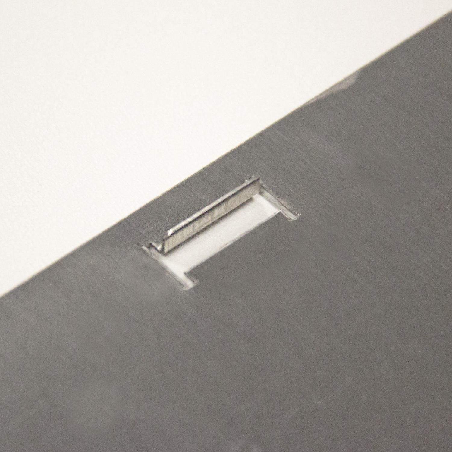 Stainless steel mounting bracket slot for propane tank hole cover