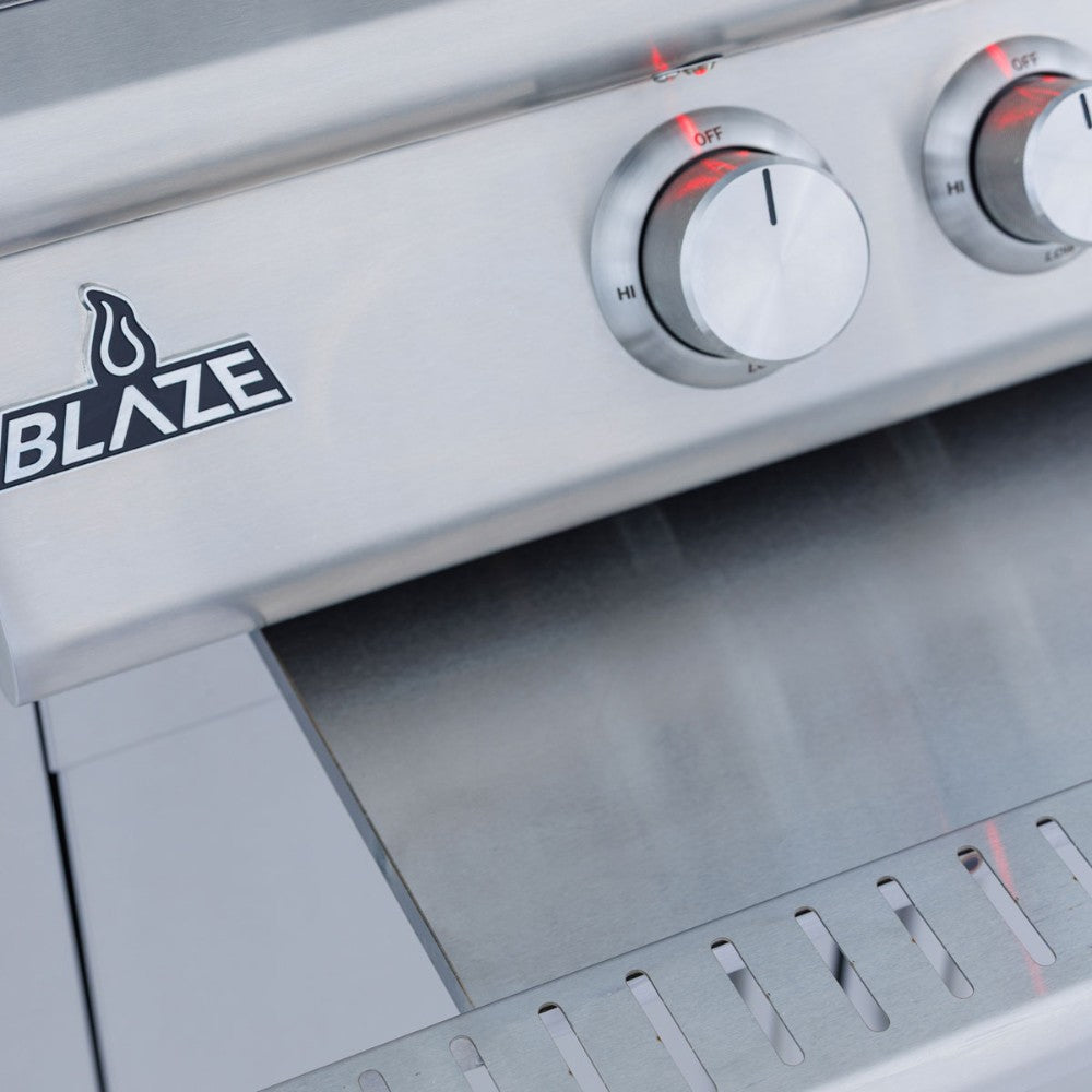 Stainless outdoor oven control panel with Blaze logo and three temperature knobs