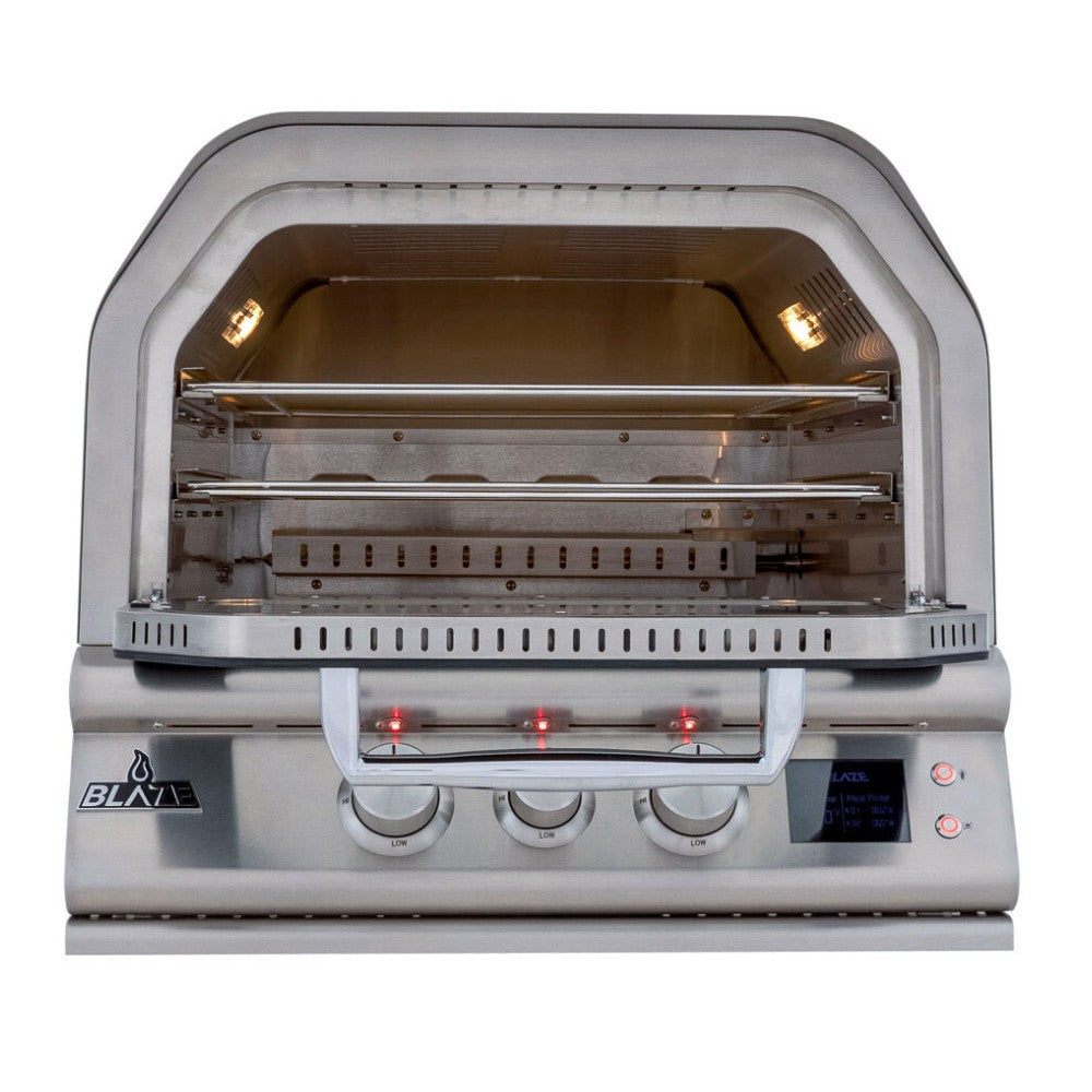 Built-in outdoor pizza oven with open door showing stainless interior cooking chamber