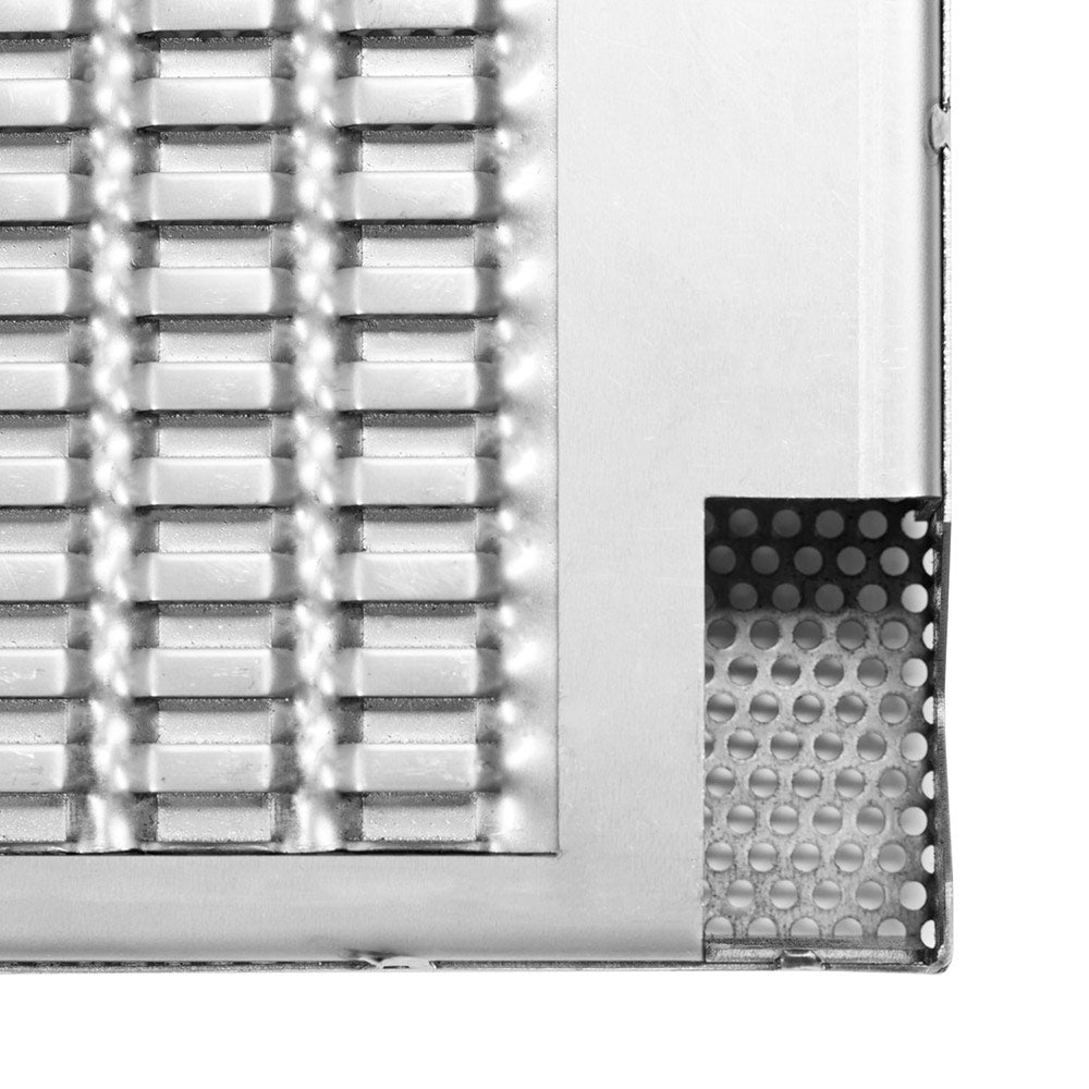 Perforated flame tamer insert with mesh panels and side vent holes