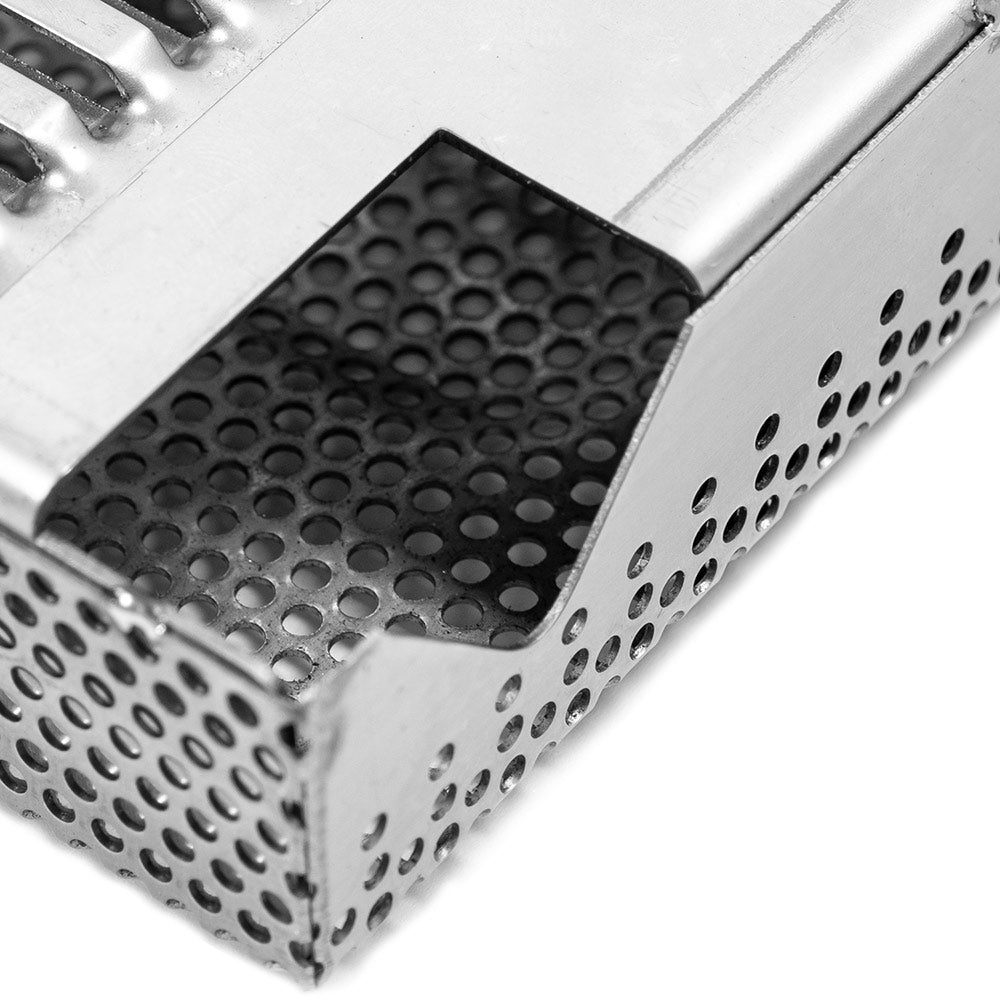 Angled view of perforated flame tamer with raised metal edges