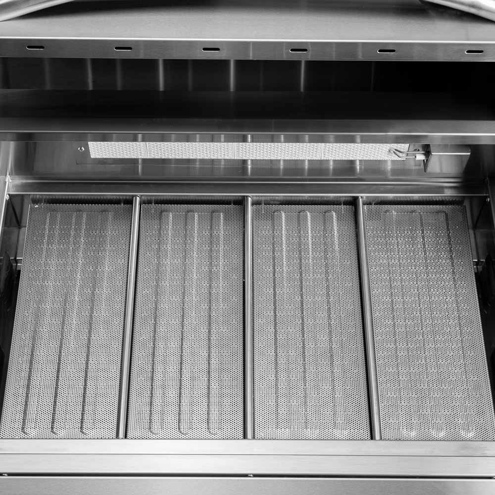 Installed flame tamers, stainless perforated panels across a grill firebox