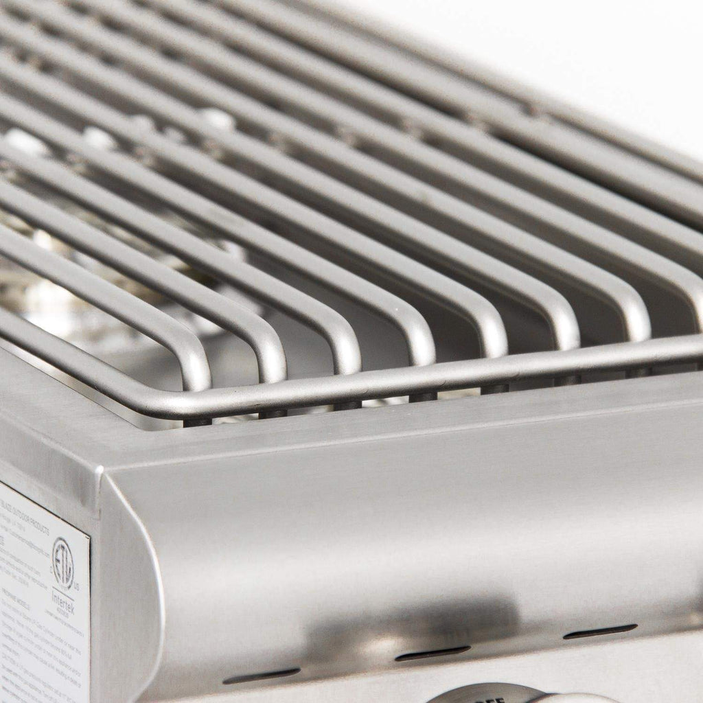 Stainless steel cooking grates and front vent slots on double burner grill