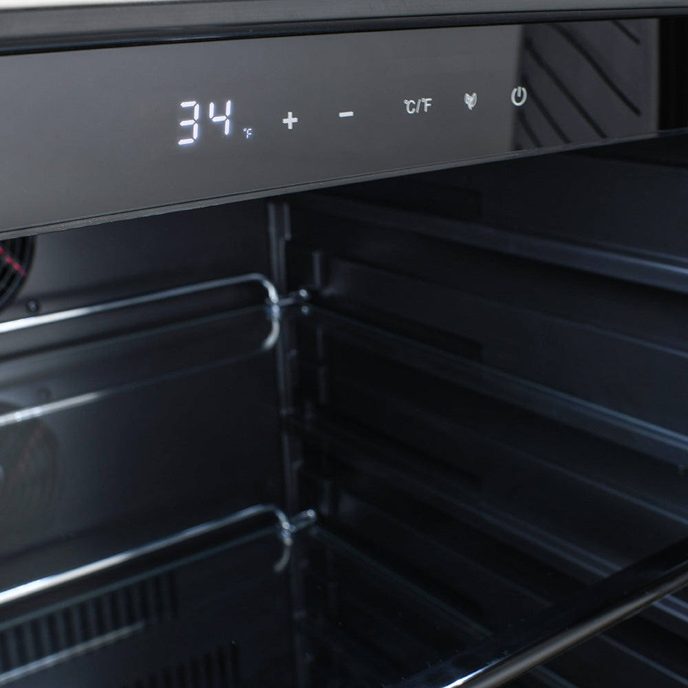 Refrigerator interior with upper temperature display showing 34°F