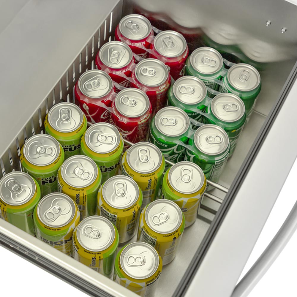 Refrigerator drawer filled with assorted soda cans in green, red, and yellow