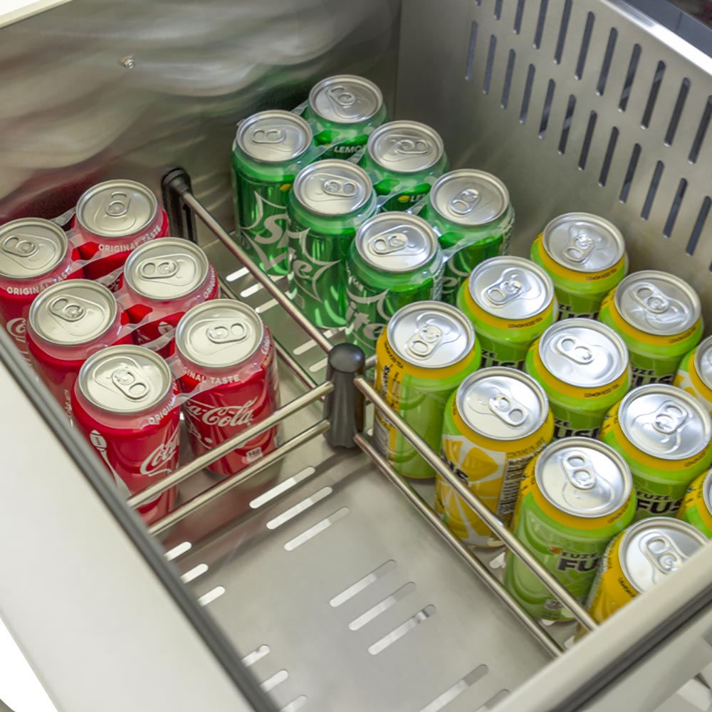 Refrigerator drawers with soda cans on wire racks, red, green, and yellow