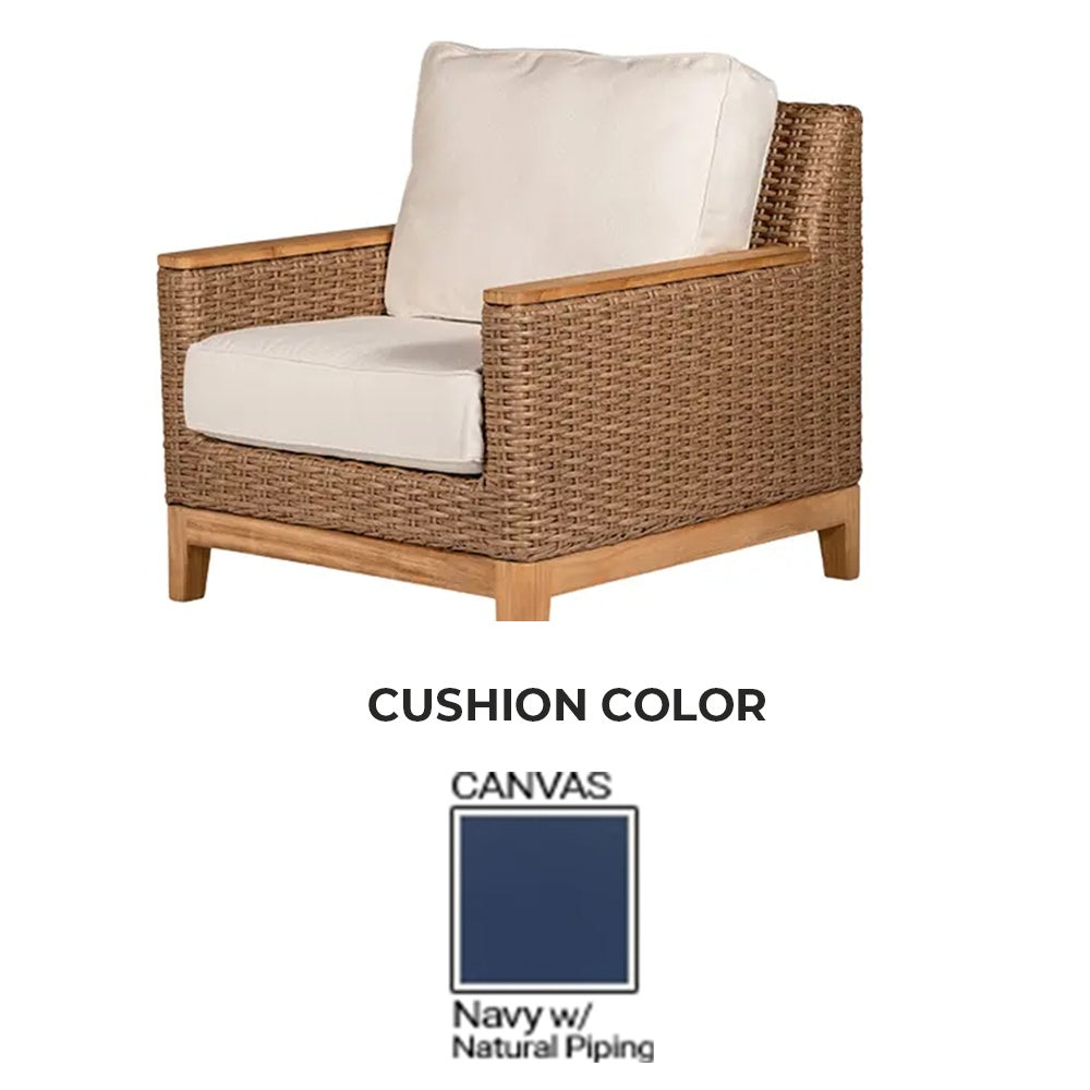Royal Teak Boca club chair with honey wicker frame and navy cushions with natural piping