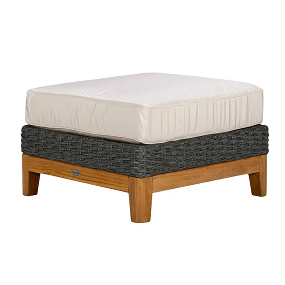 Boca ottoman with light cushion, charcoal woven base, and honey-wood legs