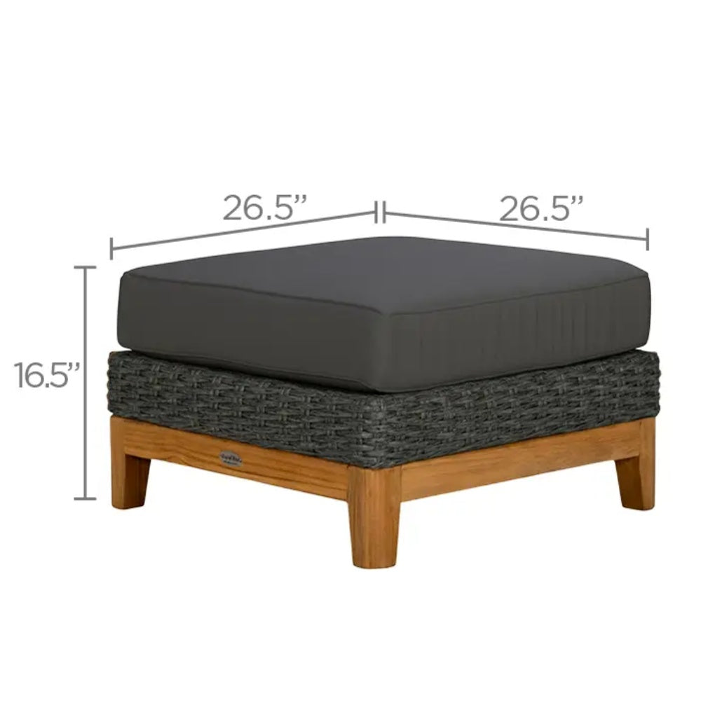 Boca ottoman with dark cushion, charcoal woven base, and honey-wood legs