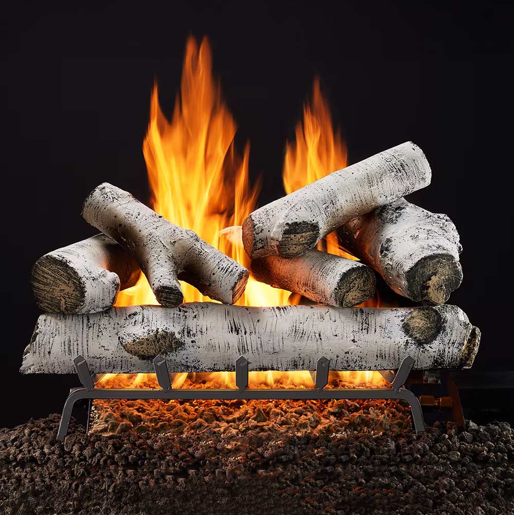 Vented outdoor gas log set with birch-style logs and open flames on grate