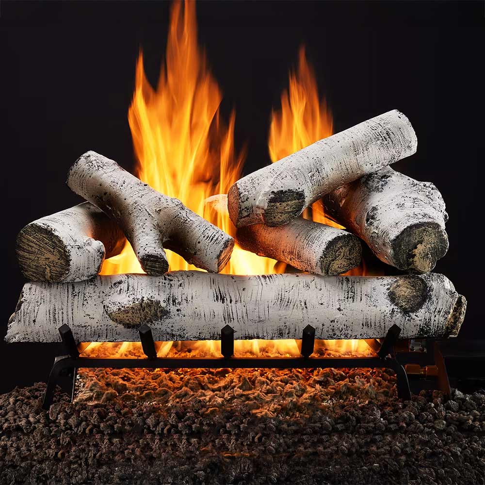 Birch gas log set with glowing logs and tall indoor flames