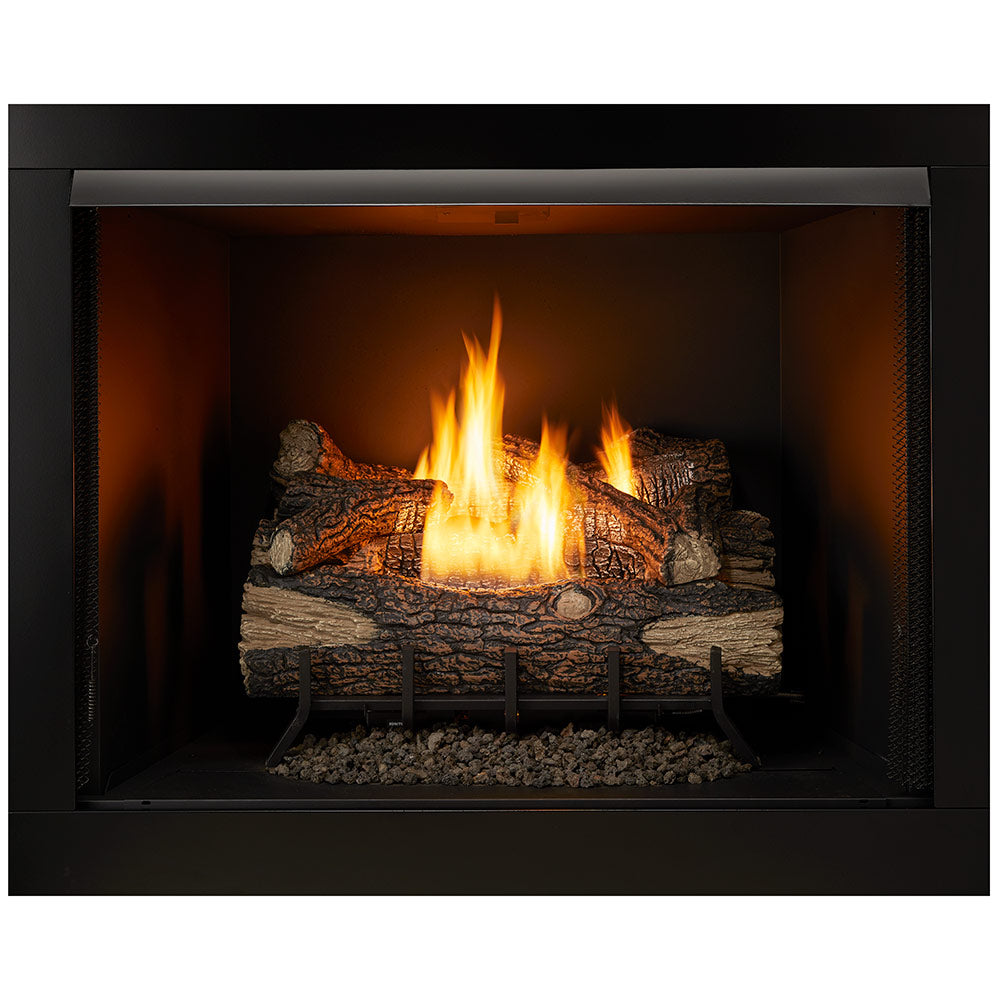 Vent-free firebox insert with gas log set showing burning flames and log bed