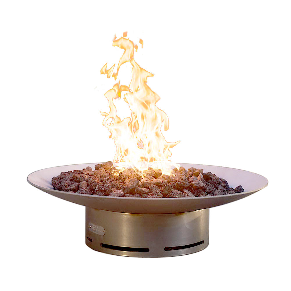 Stainless steel gas fire pit with flames and dark lava rocks in a round bowl