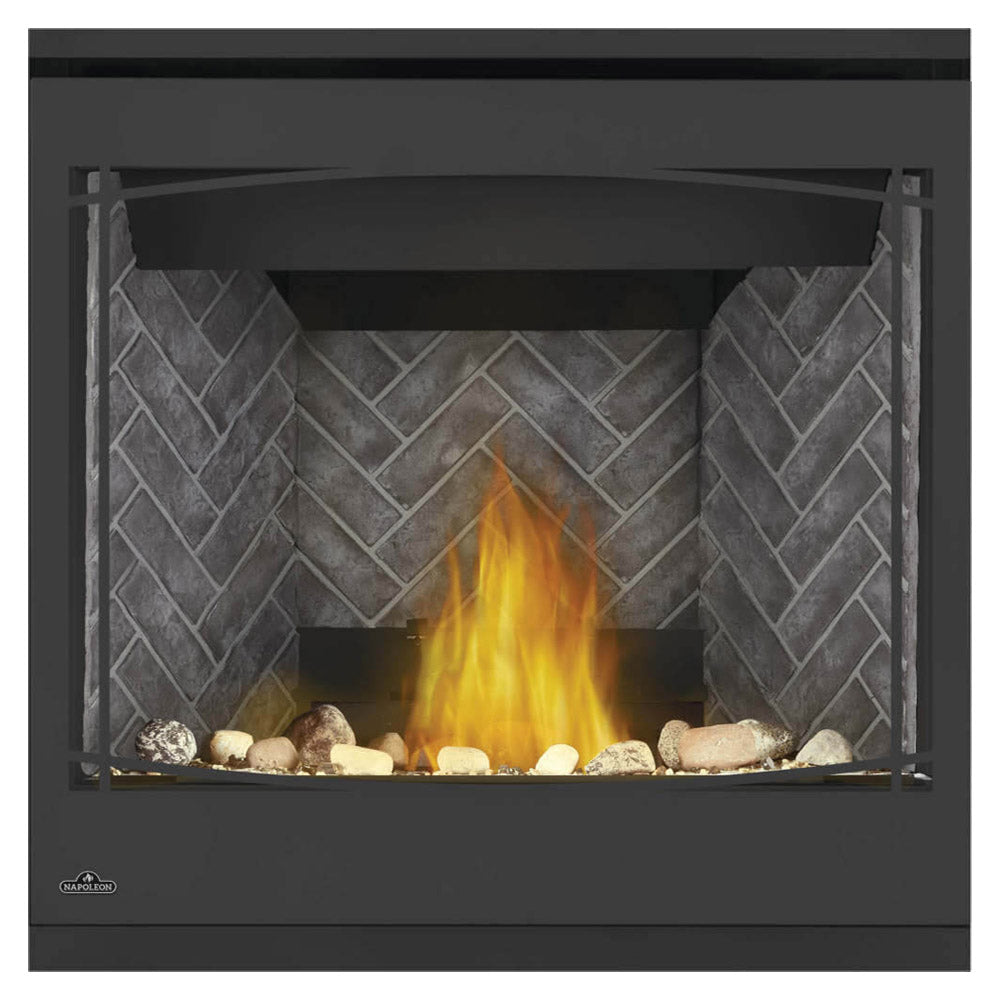 Black direct vent gas fireplace with glass front, flames, and log set on stone backing