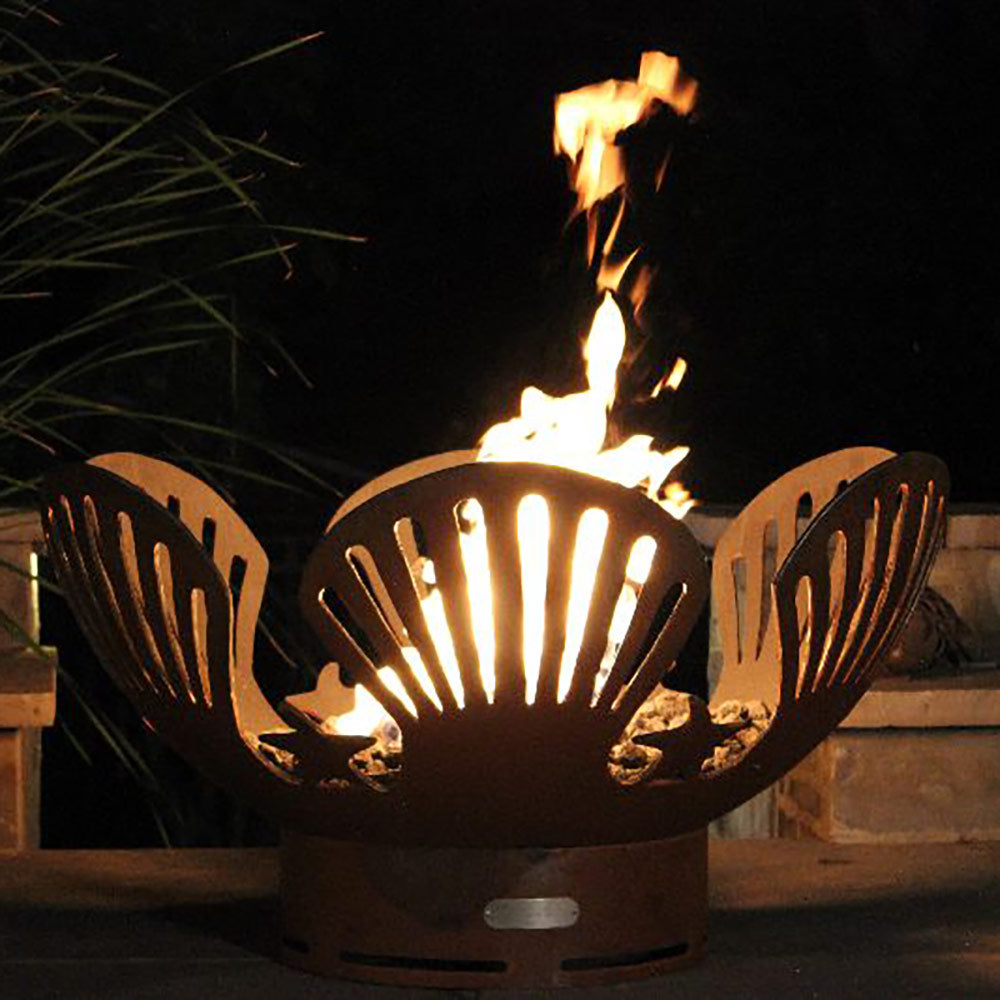 Gas fire pit with fan-shaped cutout screens and visible flames