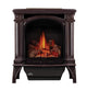 Brown cast iron gas stove with arched firebox and flame viewing window