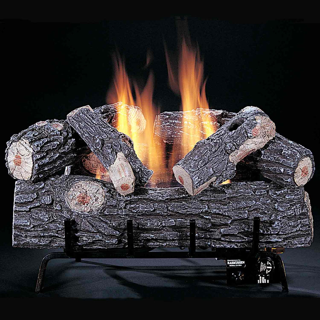 Ventless gas burner with burning wood logs and visible yellow-orange flames