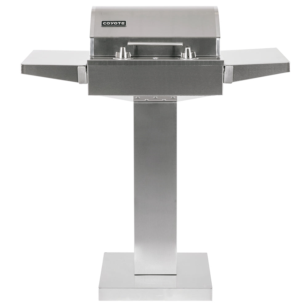 Coyote stainless electric grill on pedestal, front view with control knobs
