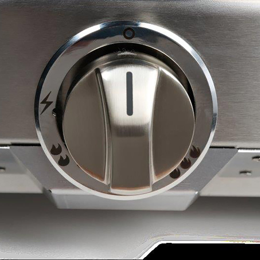 Firebox control dial with heat vents and indicator marks, stainless interior