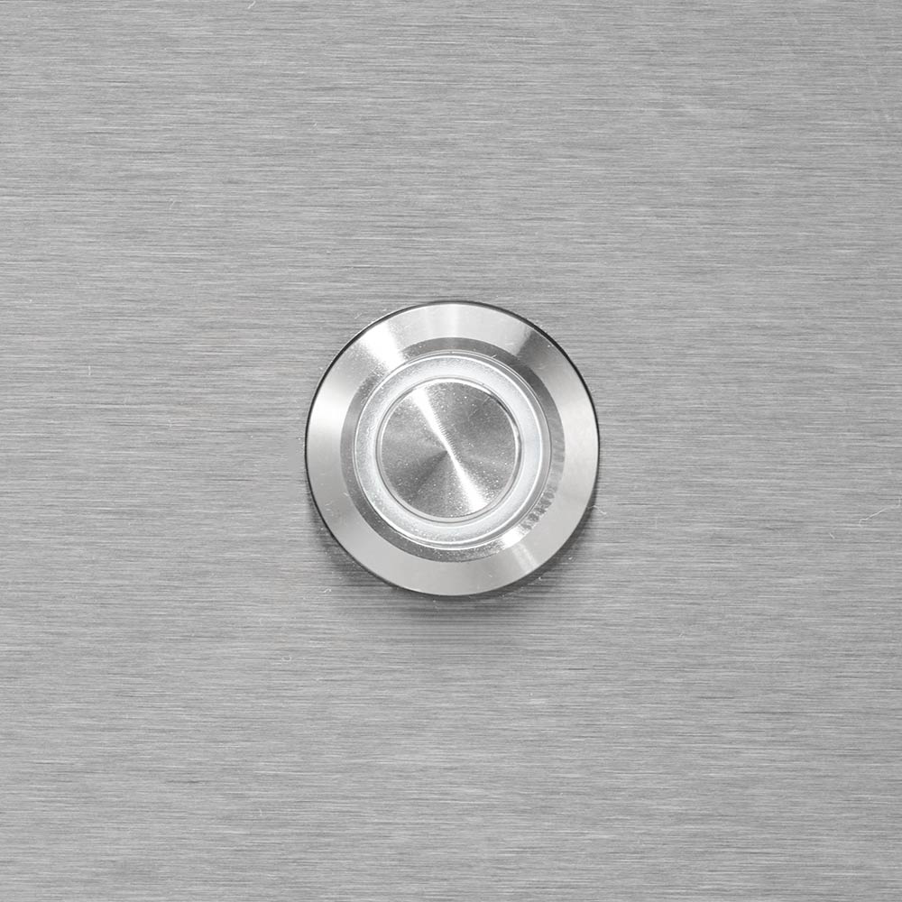 Coyote temperature gauge on stainless steel grill control panel