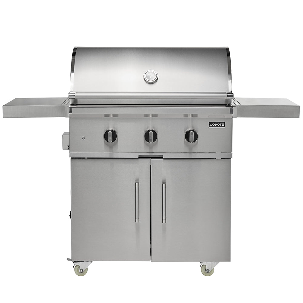 Stainless steel freestanding gas grill with hood and three front control knobs