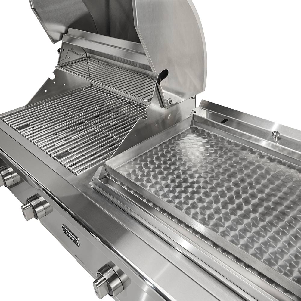 Opened grill hood showing cooking grates and adjacent flat top plate