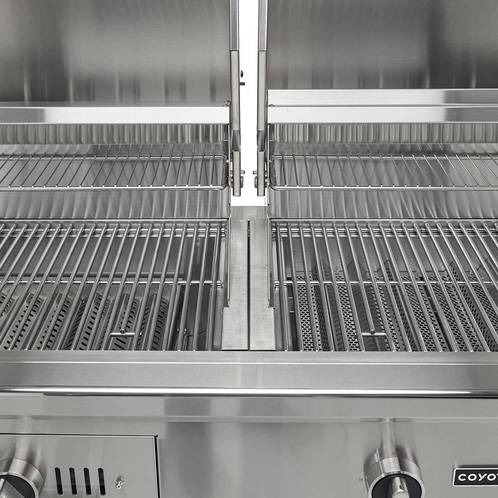 Built-in hybrid grill interior view with two hinged grate sections and center divider