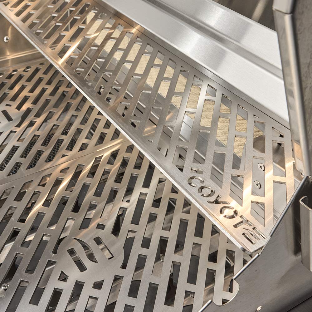 Stainless steel grill grate with angled flame-flavor channels