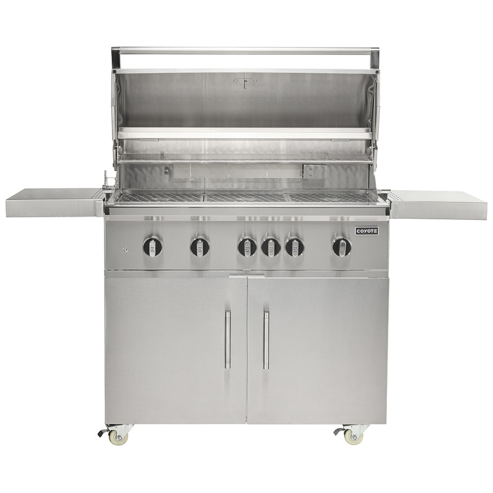 Stainless steel freestanding gas grill with open hood, burners, and front control knobs.