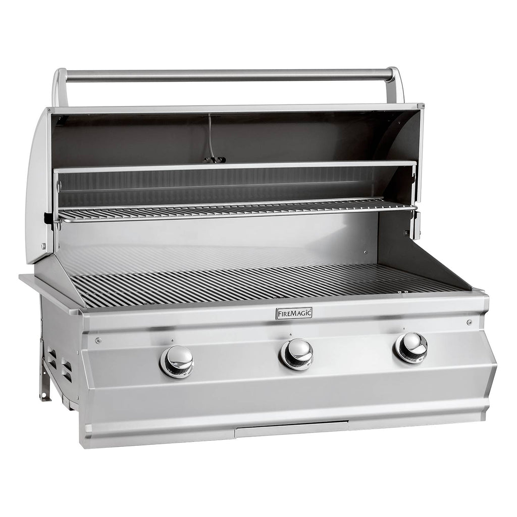 Stainless steel built-in gas grill with open hood and cooking grates