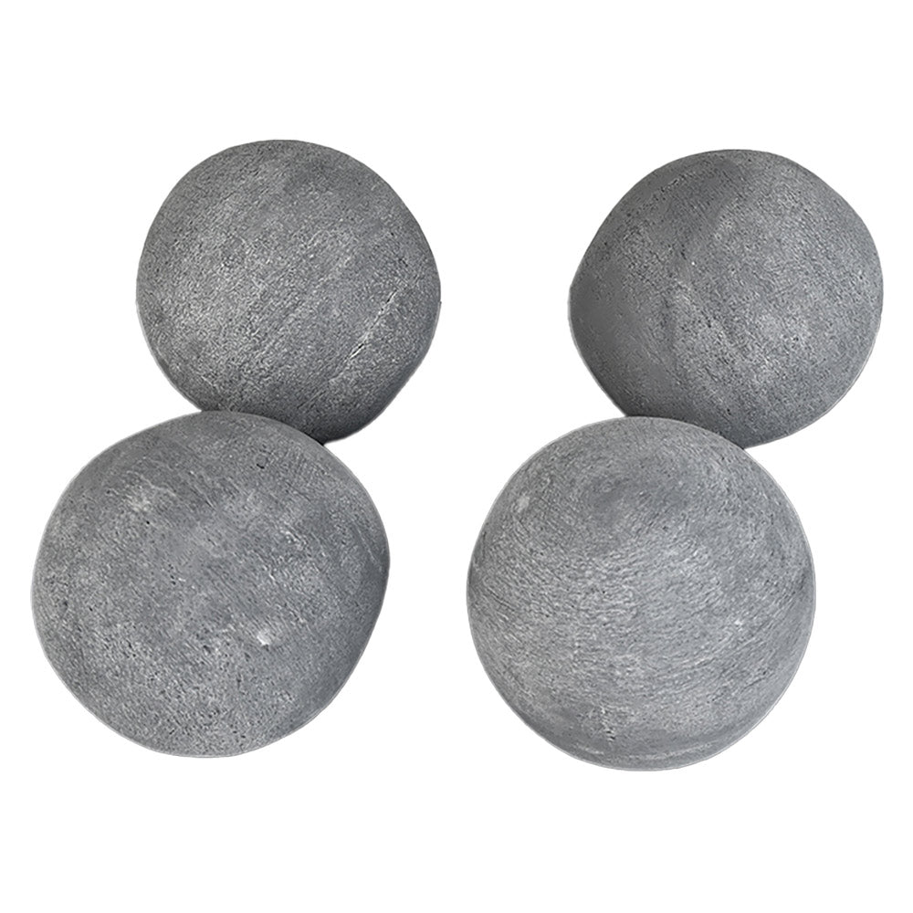 Four grey 6-inch cannon balls for a fireplace set, close-up