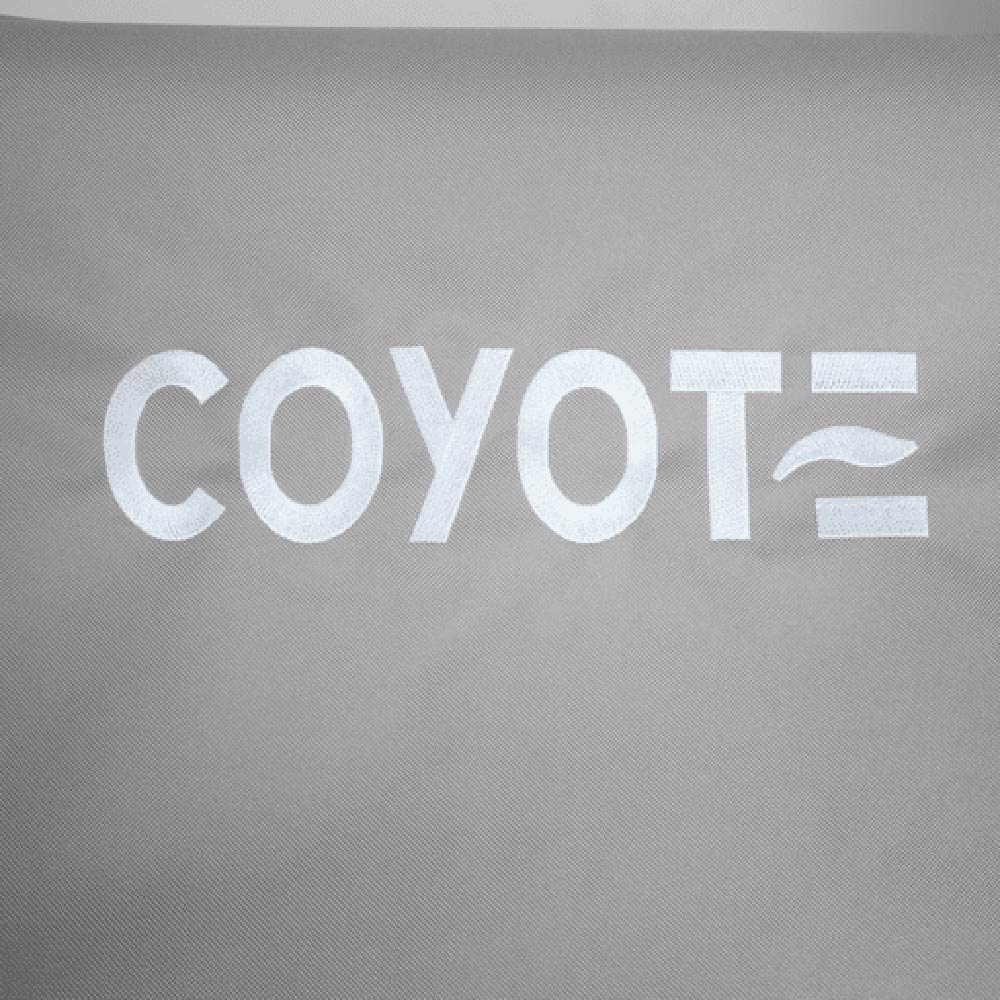 Coyote logo on light gray vinyl grill cover fabric