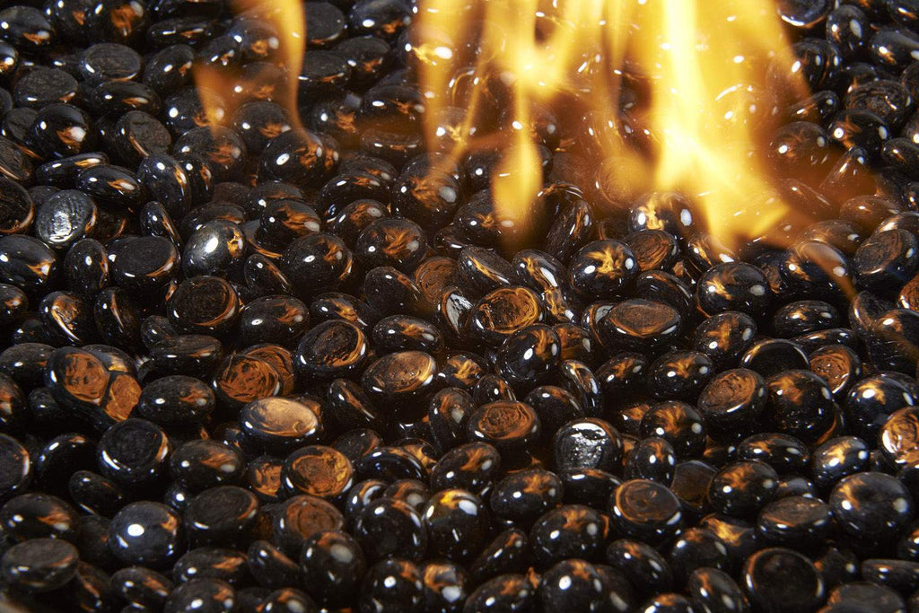Onyx black fire glass gems with flames rising among the stones