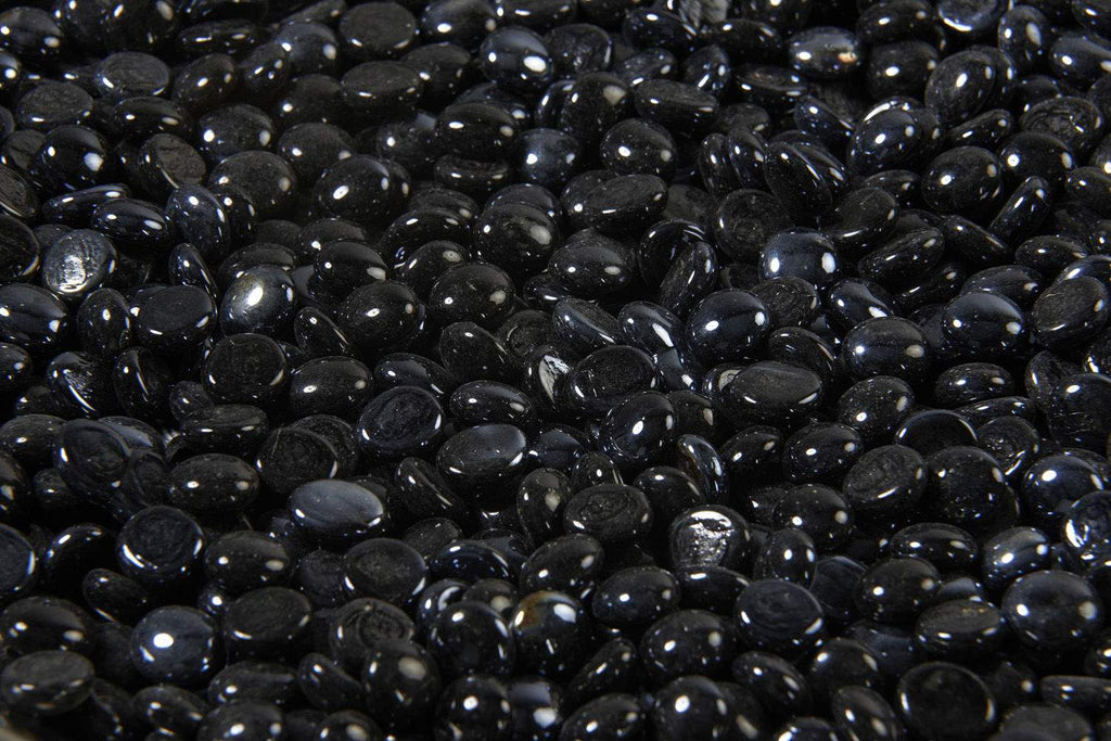 Onyx black fire glass gems, glossy oval crystals