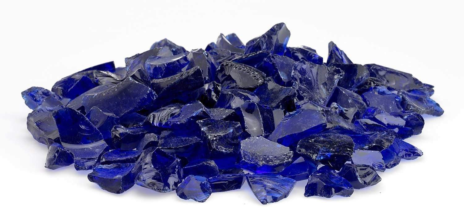Dark blue recycled fire glass chunks, loose pile, side view