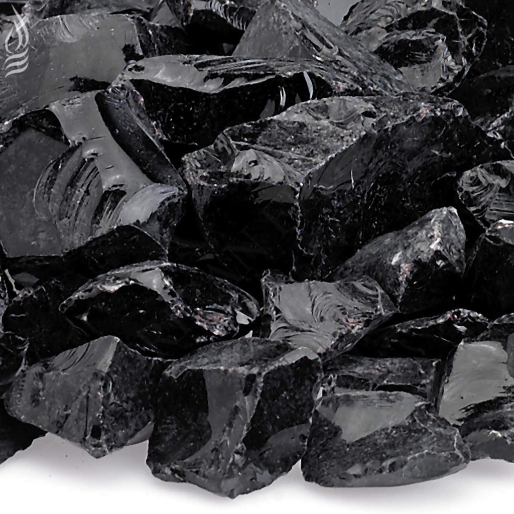 Close-up of onyx black recycled fire glass shards with glossy facets