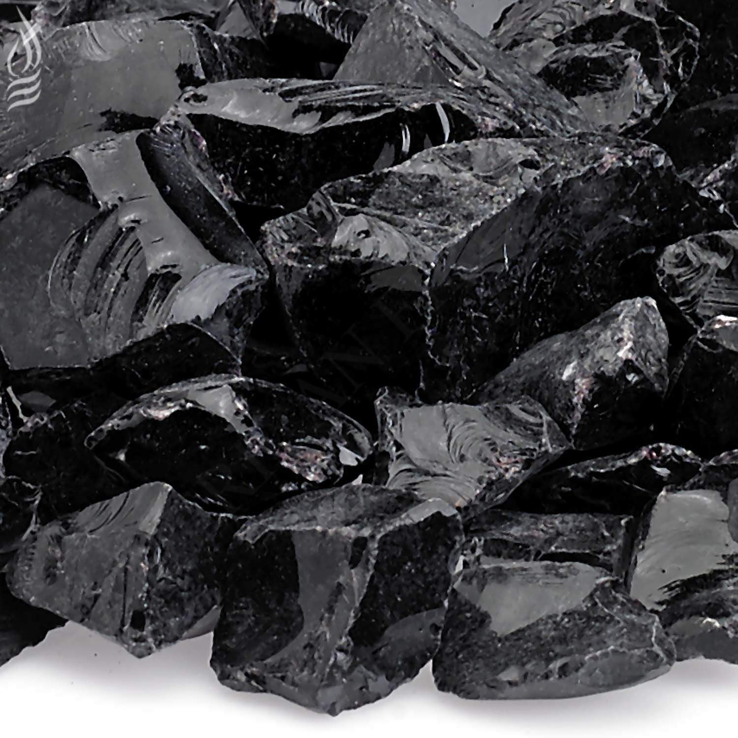 Close-up of onyx black recycled fire glass shards with glossy facets