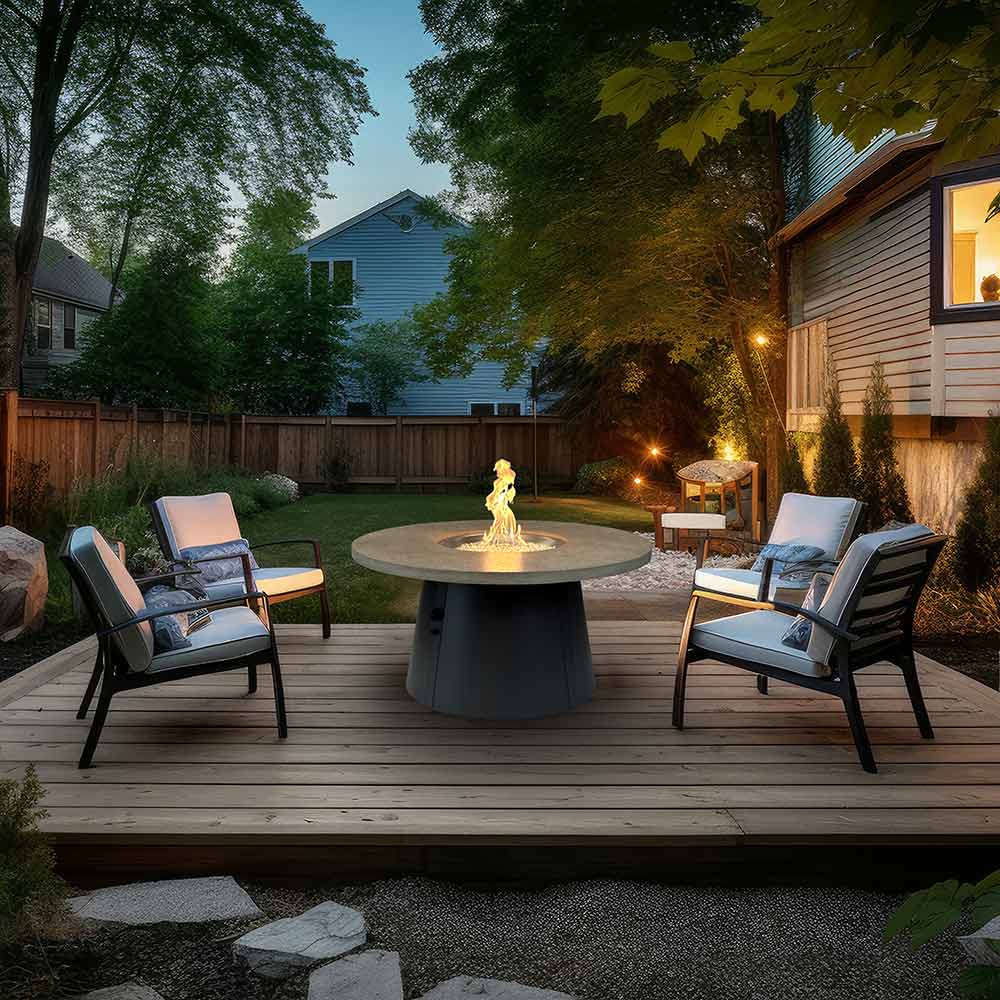 Outdoor round gas fire pit table with flame, dark base, and metal fire bowl