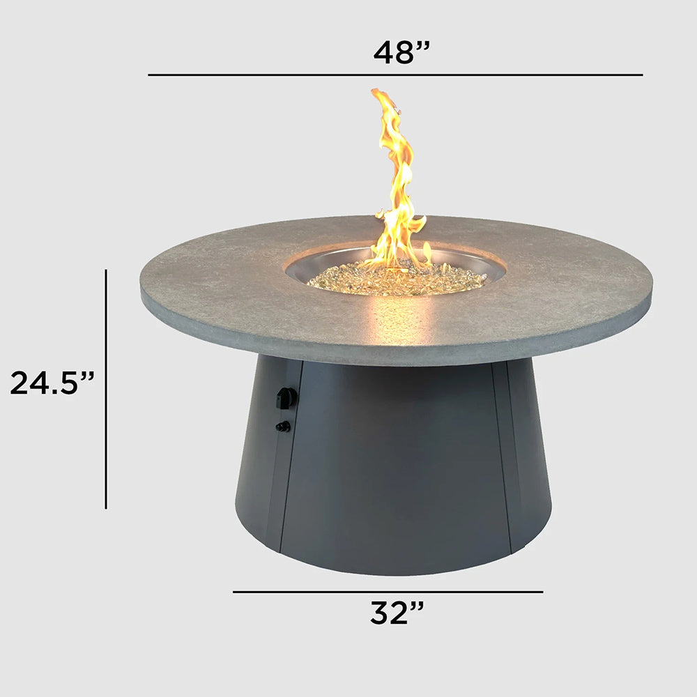 Round 48-inch gas fire pit table with flame and dark base, stone top